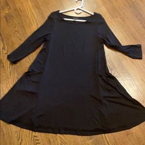 Black swing dress w/ pockets. Very comfortable!